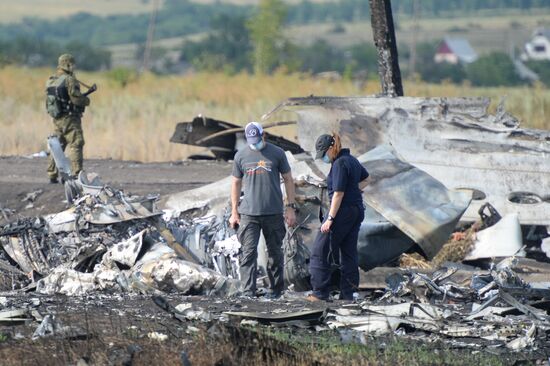 OSCE employees and experts work at Malaysia Airlines Boeing 777 crash site