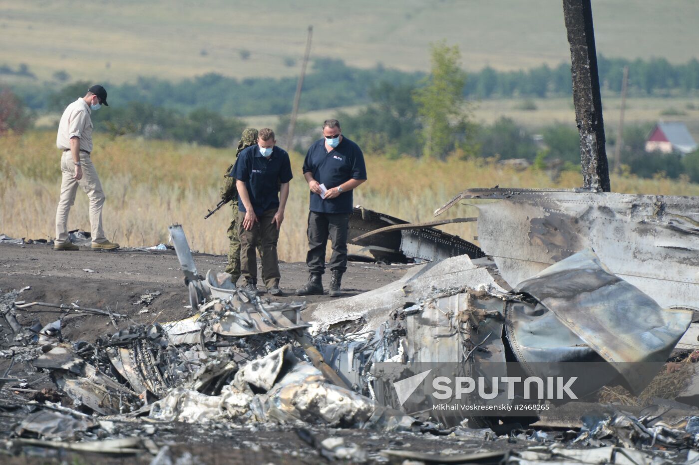 OSCE employees and experts work at Malaysia Airlines Boeing 777 crash site