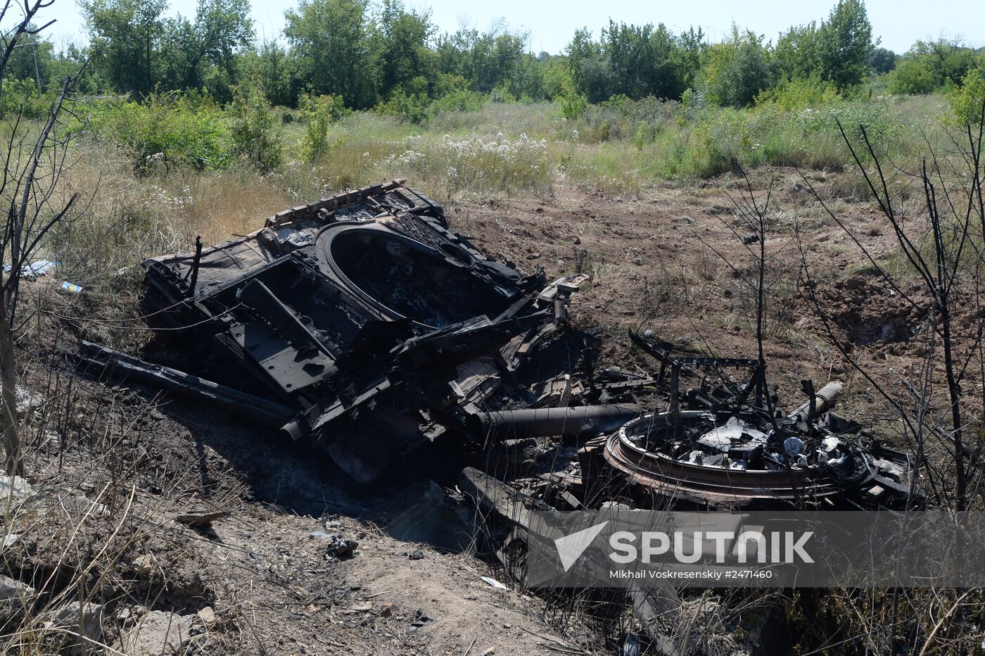 Ukrainian army's military equipment destroyed by militia at the entrance to Donetsk