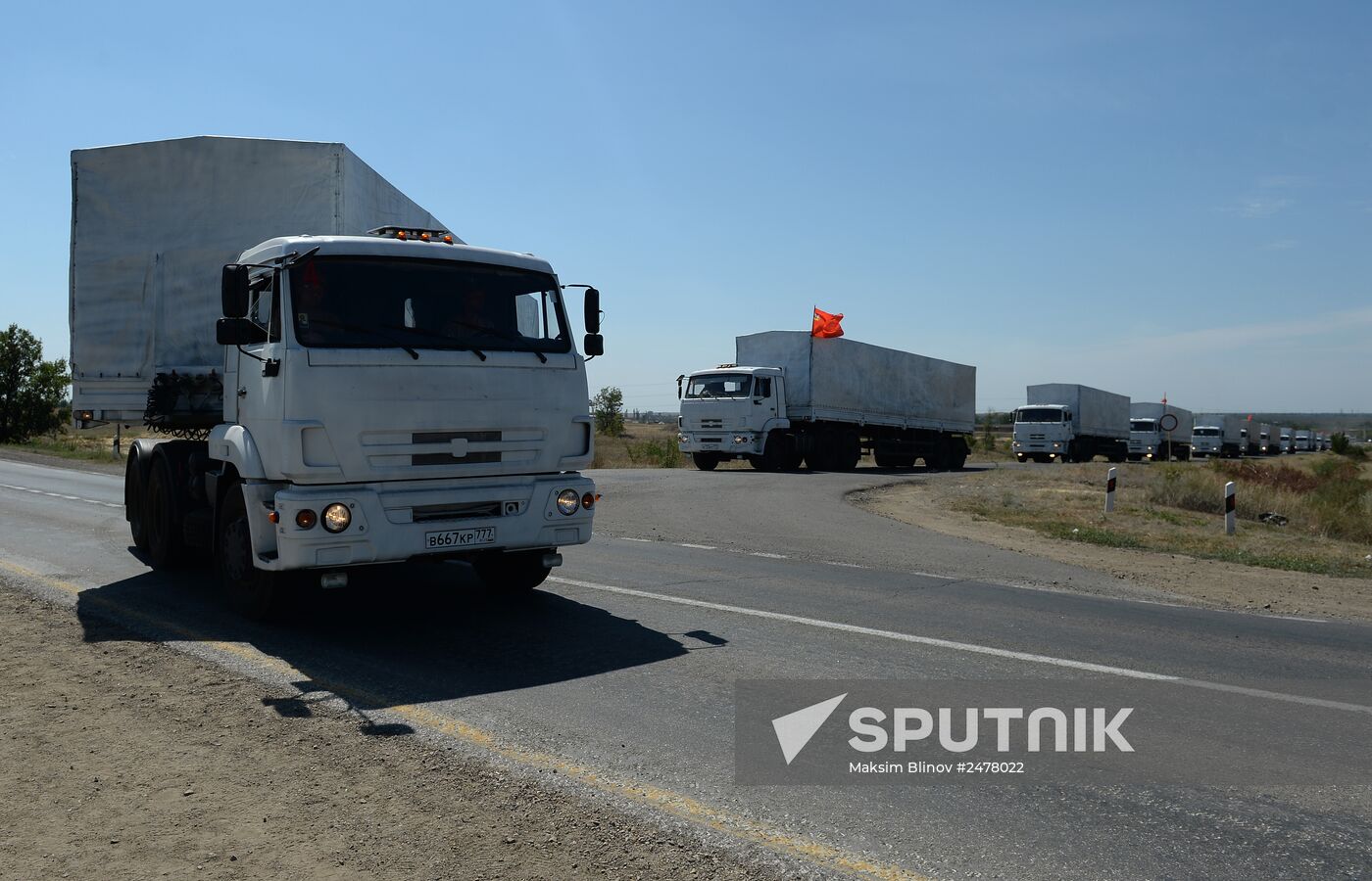 Russian humanitarian convoy trucks arrive at checkpoint at Russian-Ukrainian border