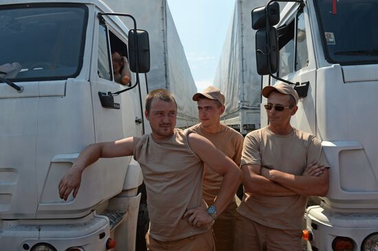Russian humanitarian convoy trucks arrive at checkpoint at Russian-Ukrainian border