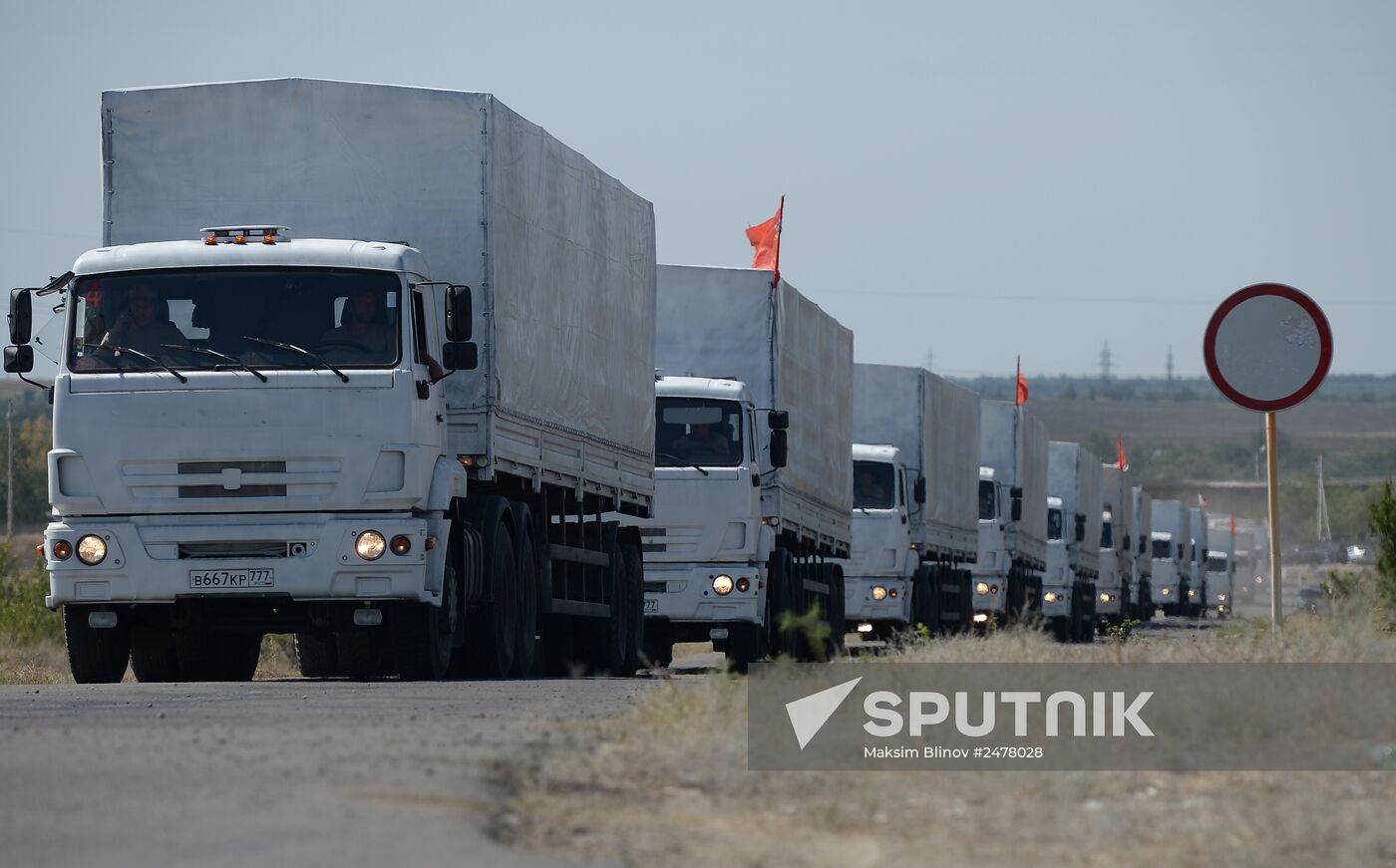 Russian humanitarian convoy trucks arrive at checkpoint at Russian-Ukrainian border