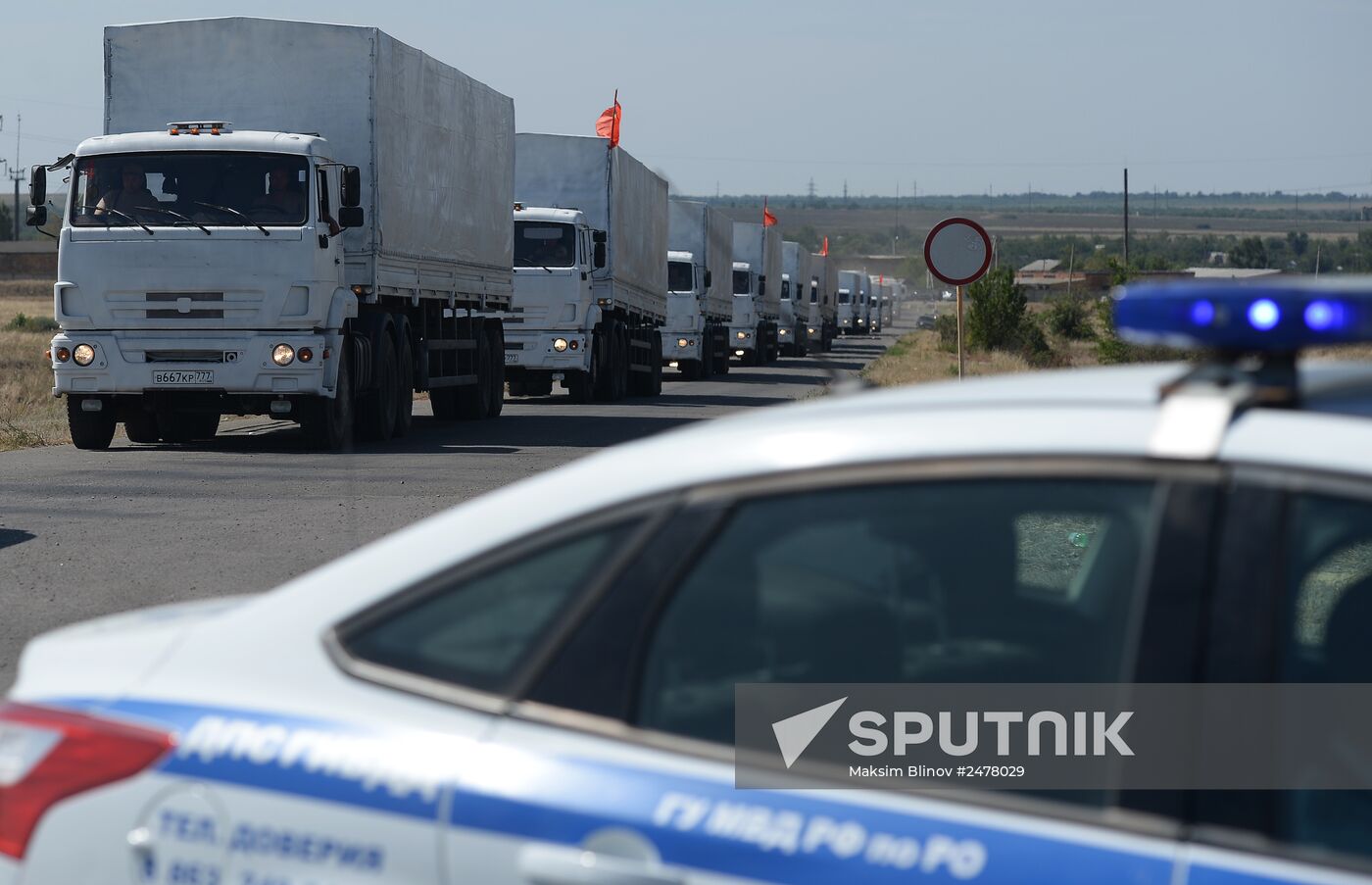 Russian humanitarian convoy trucks arrive at checkpoint at Russian-Ukrainian border
