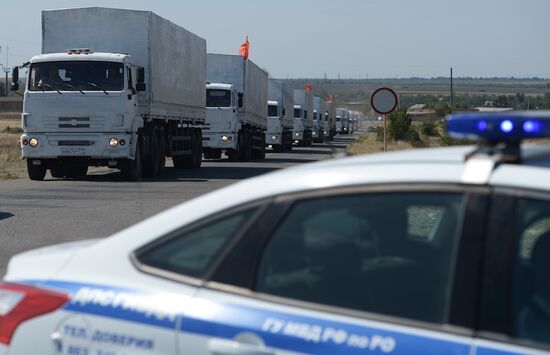 Russian humanitarian convoy trucks arrive at checkpoint at Russian-Ukrainian border