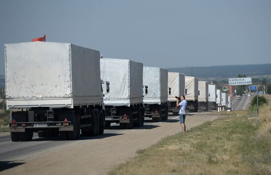 Russian humanitarian convoy trucks arrive at checkpoint at Russian-Ukrainian border