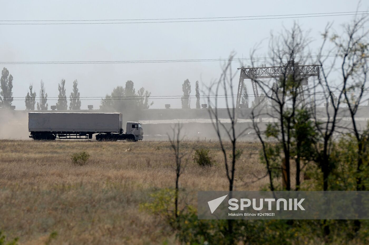 Russian humanitarian convoy trucks arrive at checkpoint at Russian-Ukrainian border