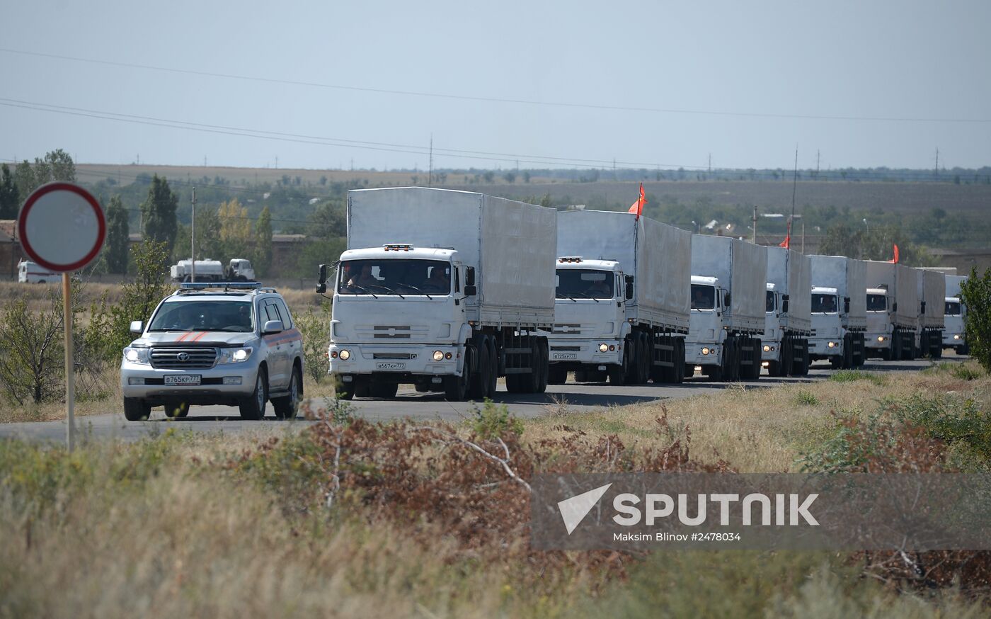 Russian humanitarian convoy trucks arrive at checkpoint at Russian-Ukrainian border