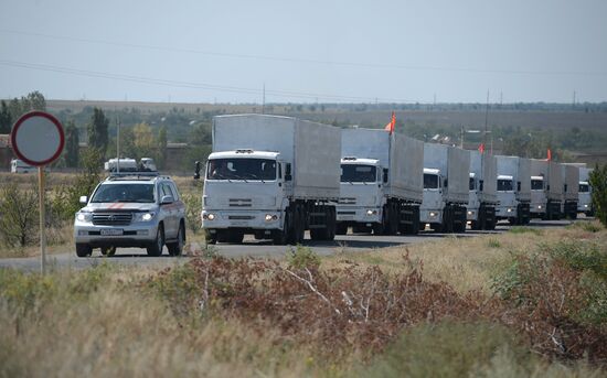 Russian humanitarian convoy trucks arrive at checkpoint at Russian-Ukrainian border