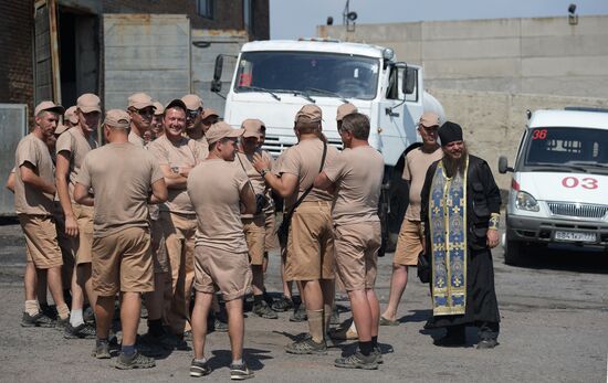Russian humanitarian convoy trucks arrive at checkpoint at Russian-Ukrainian border