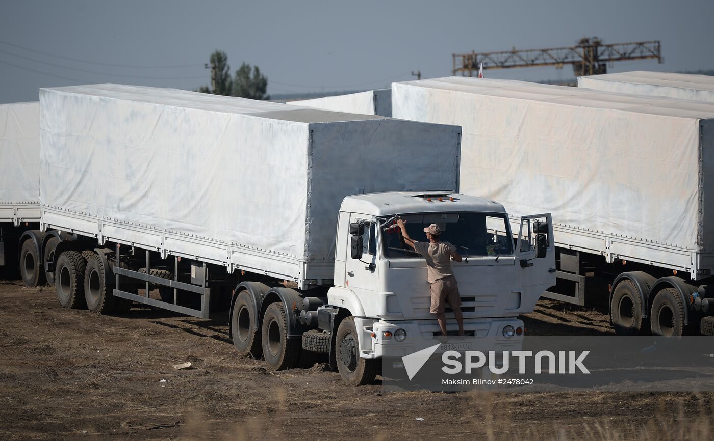 Russian humanitarian convoy trucks arrive at checkpoint at Russian-Ukrainian border