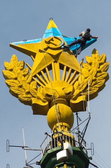 Unknown people paint Stalinist building spire colors of Ukraine