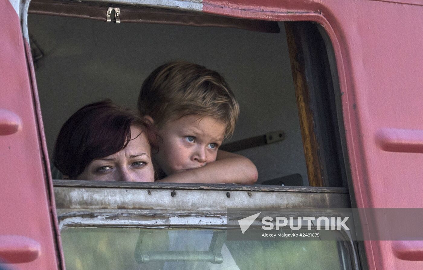 Ukrainian refugees arrive in Omsk