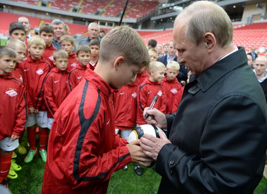 Vladimir Putin visits Otrkitie Arena Stadium in Tushino