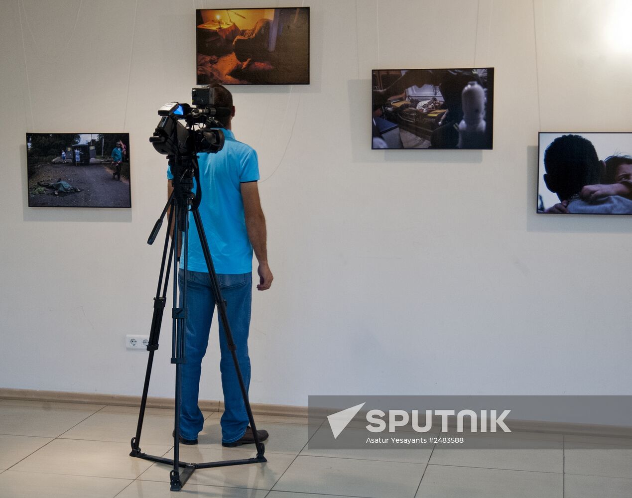 Photo exhibition in support of missing Rossiya Segodnya photographer Andrei Stenin