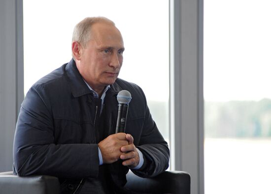 Vladimir Putin attends Seliger 2014 National Youth Forum