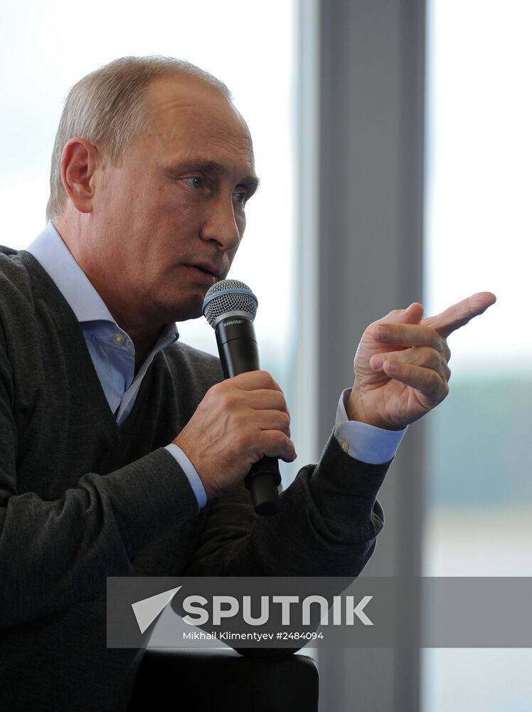 Vladimir Putin attends Seliger 2014 National Youth Forum