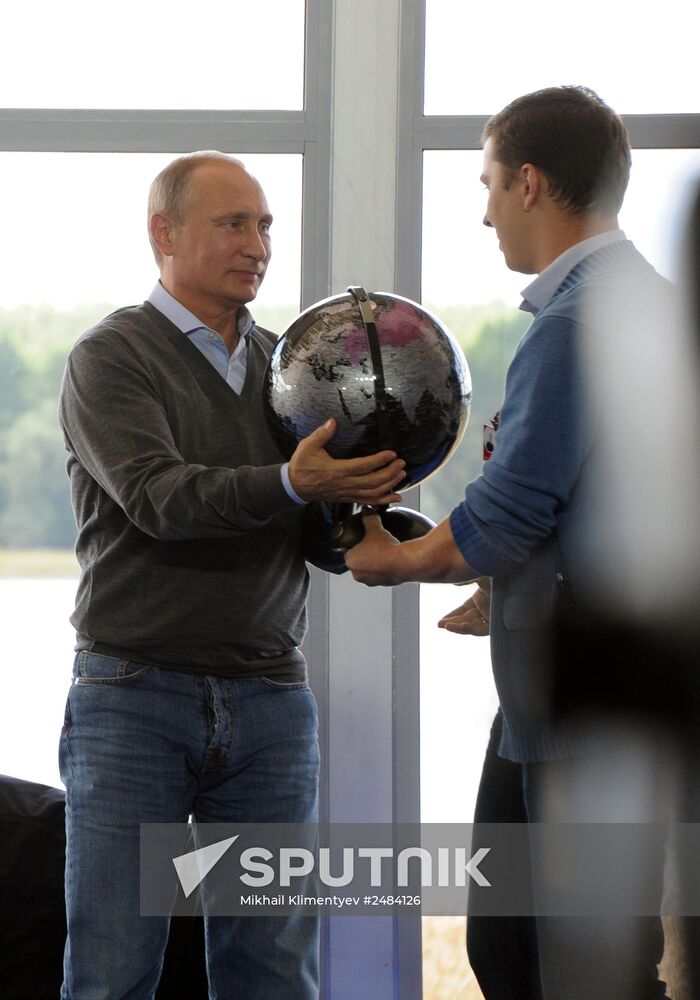 Vladimir Putin attends Seliger 2014 National Youth Forum