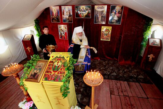 Consecrating makeshift church at fire-range of Sergeuevsky Training Center, Primorye Territory