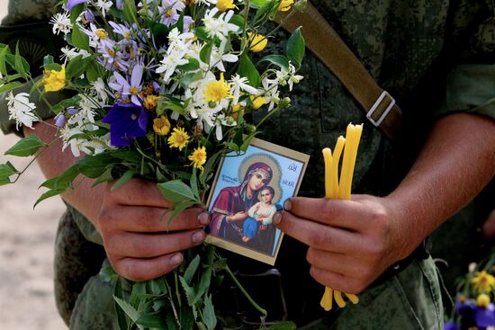 Consecrating makeshift church at fire-range of Sergeuevsky Training Center, Primorye Territory