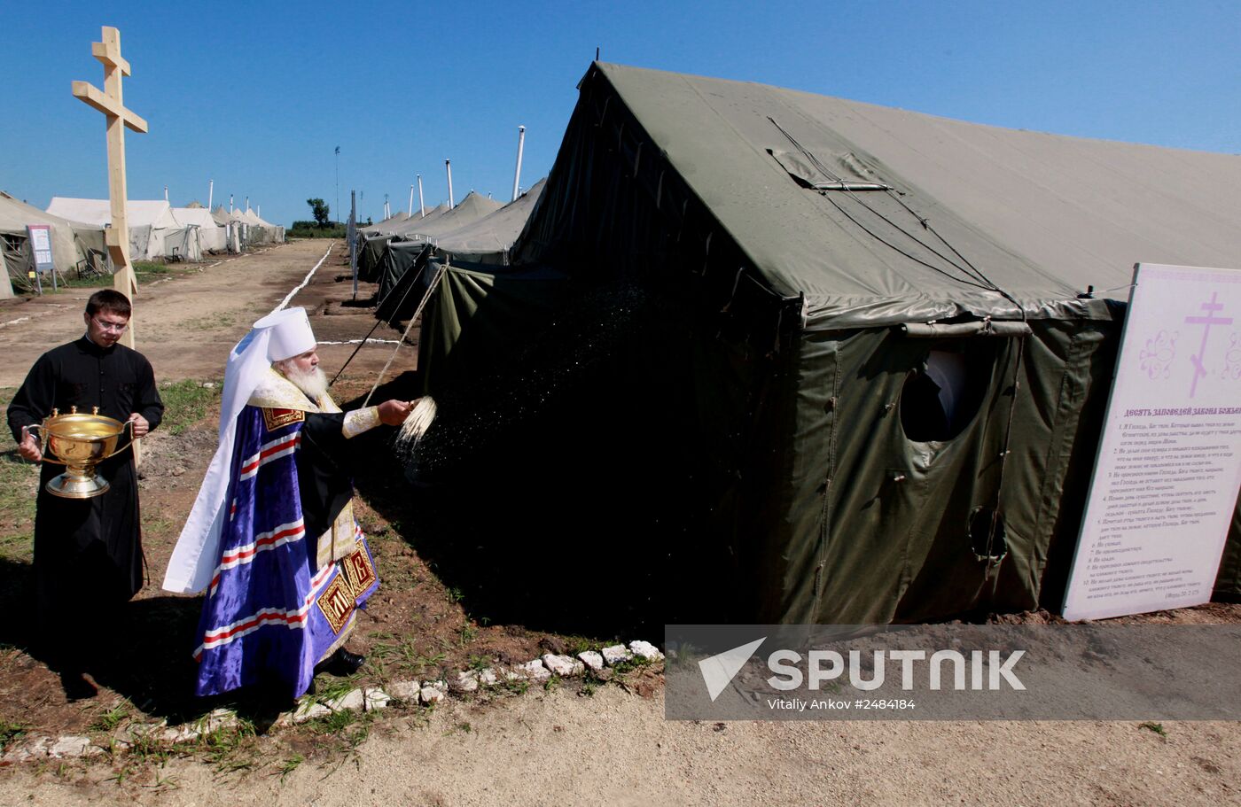 Consecrating makeshift church at fire-range of Sergeuevsky Training Center, Primorye Territory