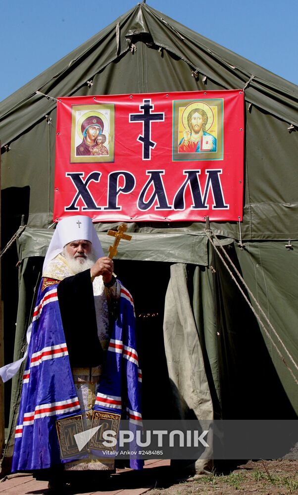 Consecrating makeshift church at fire-range of Sergeuevsky Training Center, Primorye Territory