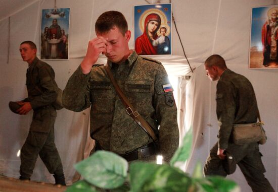 Consecrating makeshift church at fire-range of Sergeuevsky Training Center, Primorye Territory