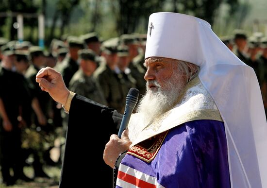 Consecrating makeshift church at fire-range of Sergeuevsky Training Center, Primorye Territory