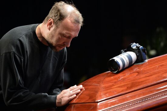 Mourning ceremony for Andrei Stenin at Rossiya Segodnya