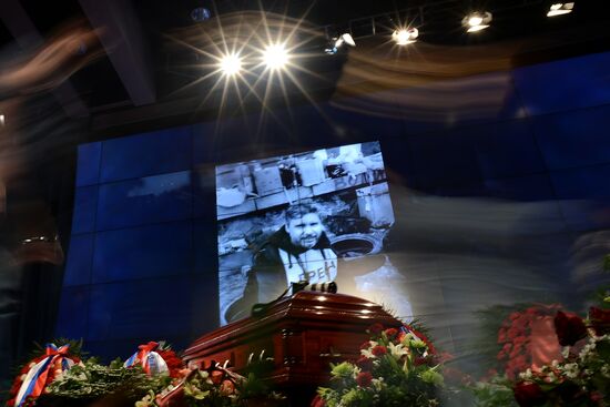 Mourning ceremony for Andrei Stenin at Rossiya Segodnya