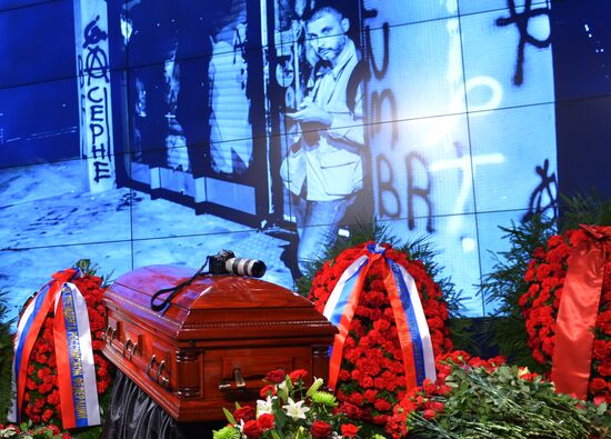 Mourning ceremony for Andrei Stenin at Rossiya Segodnya