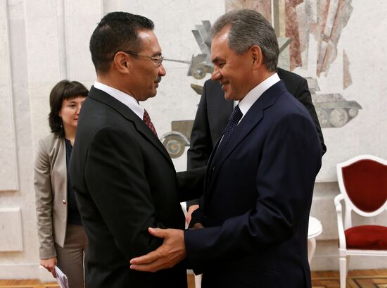 Russian Defense Minister Sergei Shoigu meets with his Malaysian counterpart Hishammuddin Hussein