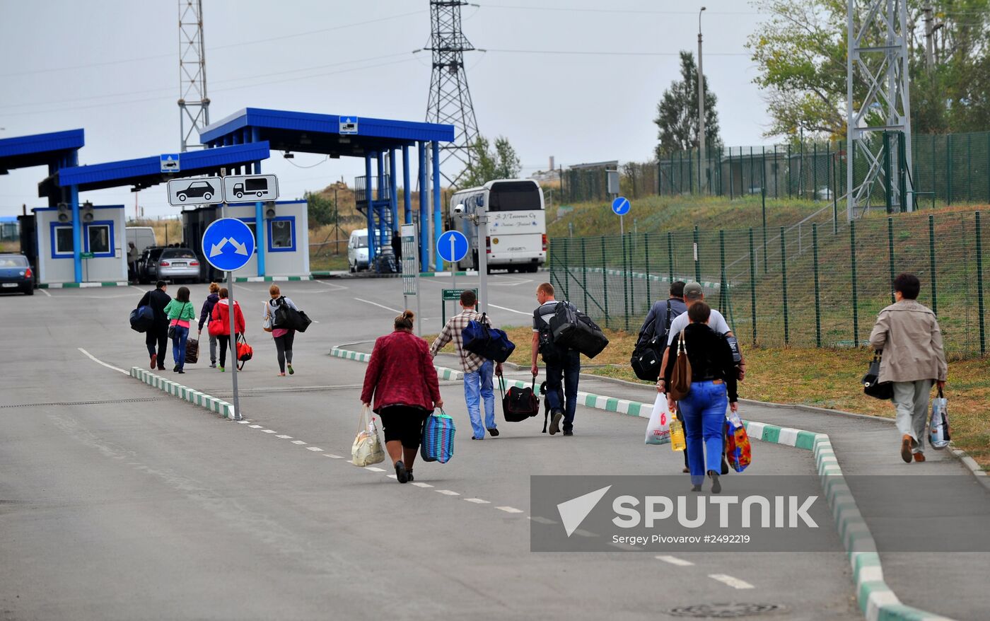 Ukrainian refugees at border crossing point in Rostov Region