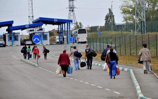 Ukrainian refugees at border crossing point in Rostov Region