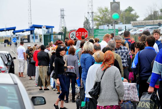 Ukrainian refugees at border crossing point in Rostov Region