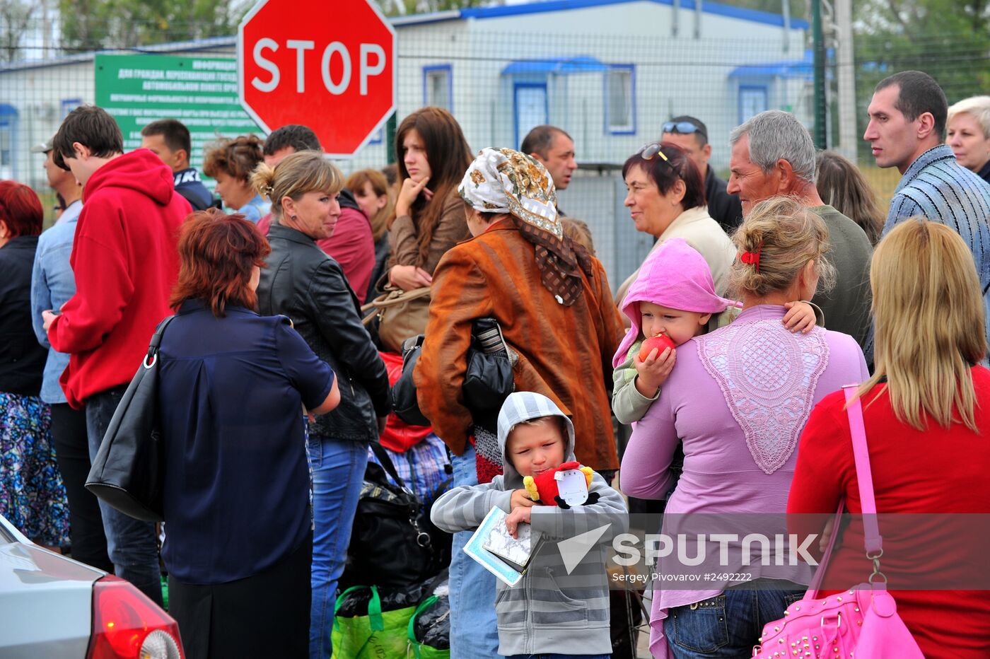 Ukrainian refugees at border crossing point in Rostov Region