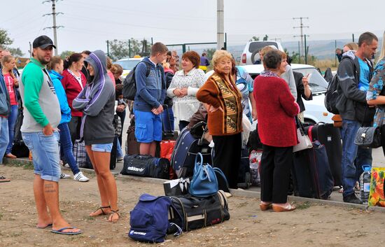 Ukrainian refugees at border crossing point in Rostov Region