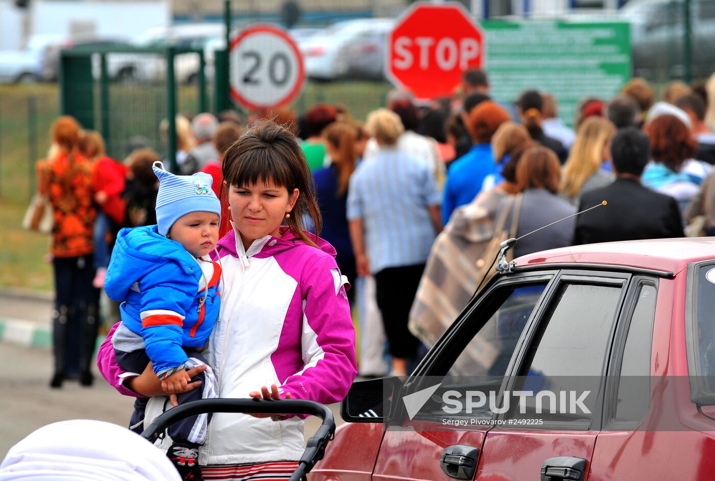 Ukrainian refugees at border crossing point in Rostov Region