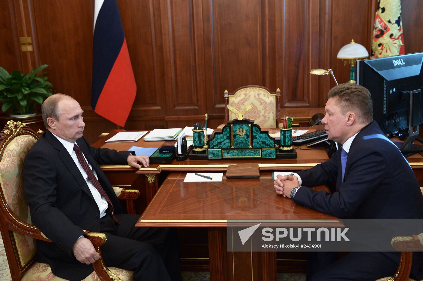 Vladimir Putin meets with Alexei Miller