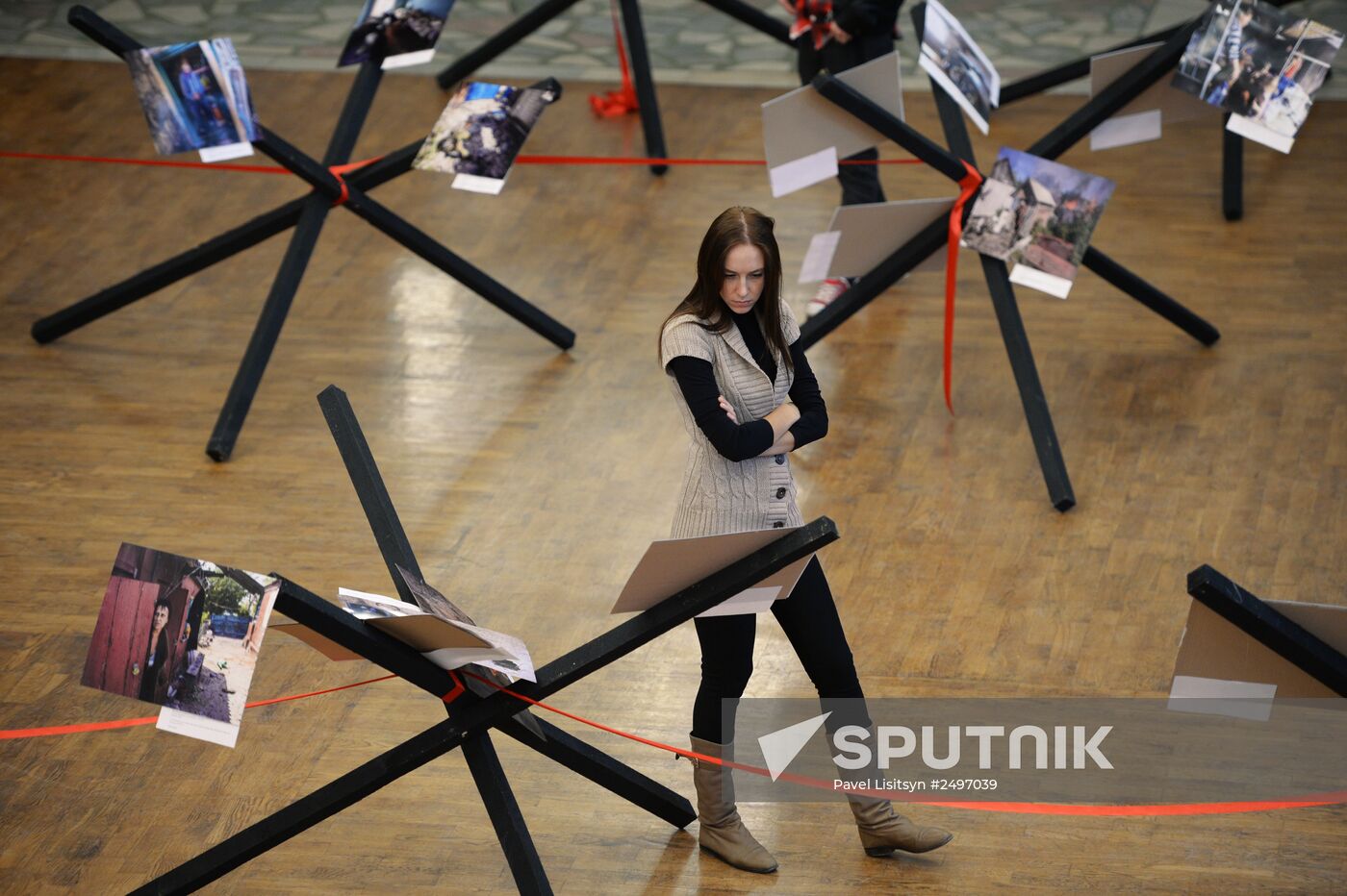 Exhibition of photographs taken by Rossiya Segodnya reporters in southeastern Ukraine