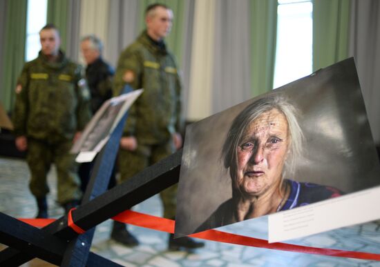 Exhibition of photographs taken by Rossiya Segodnya reporters in southeastern Ukraine