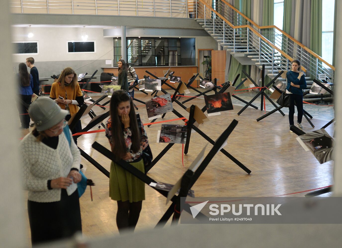Exhibition of photographs taken by Rossiya Segodnya reporters in southeastern Ukraine