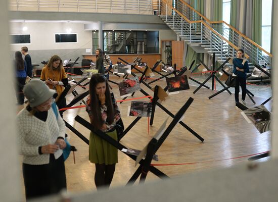Exhibition of photographs taken by Rossiya Segodnya reporters in southeastern Ukraine