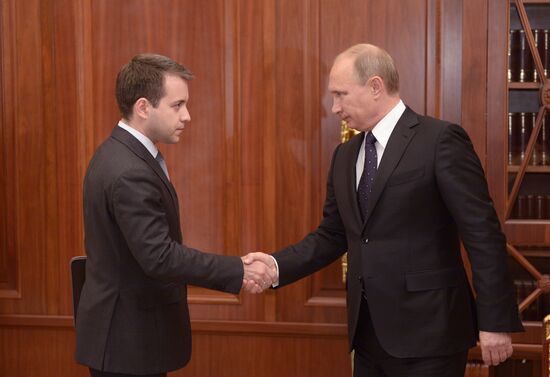 Vladimir Putin meets with Nikolai Nikiforov