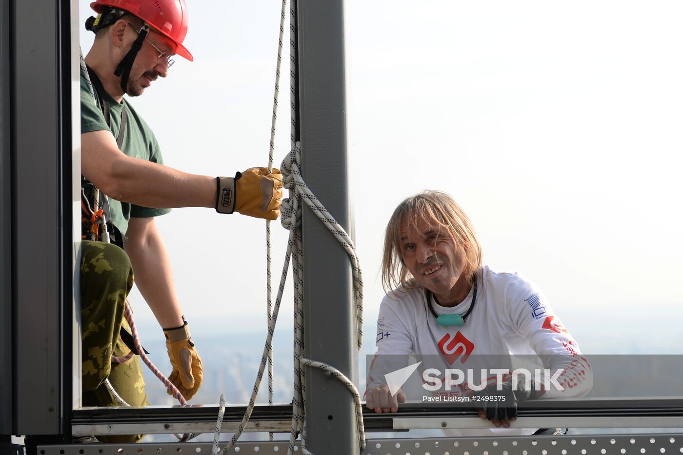Spiderman Alain Robert conquers Vysotsky skyscraper