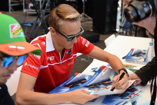 Vladimir Putin attends 2014 Formula 1 Russian Grand Prix
