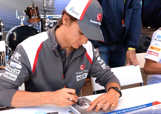 Vladimir Putin attends 2014 Formula 1 Russian Grand Prix