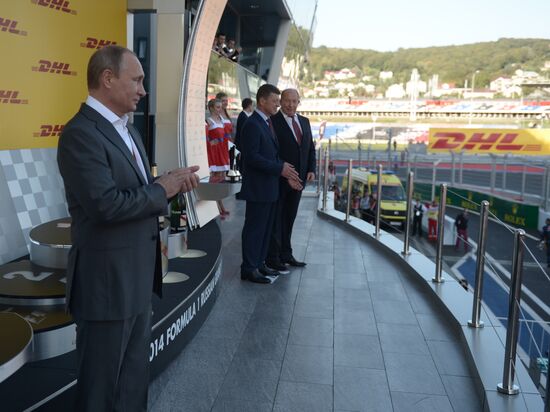 Vladimir Putin attends 2014 Formula 1 Russian Grand Prix