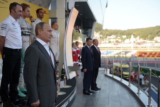 Vladimir Putin attends 2014 Formula 1 Russian Grand Prix