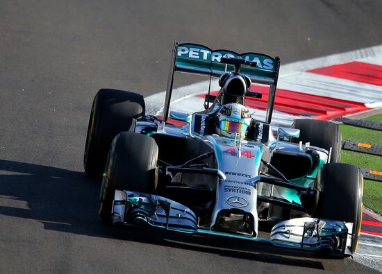 Vladimir Putin attends 2014 Formula 1 Russian Grand Prix