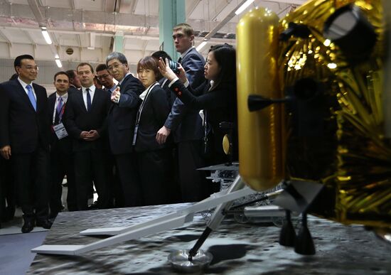 Dmitry Medvedev and Li Keqiang attend the Open Innovations International Forum